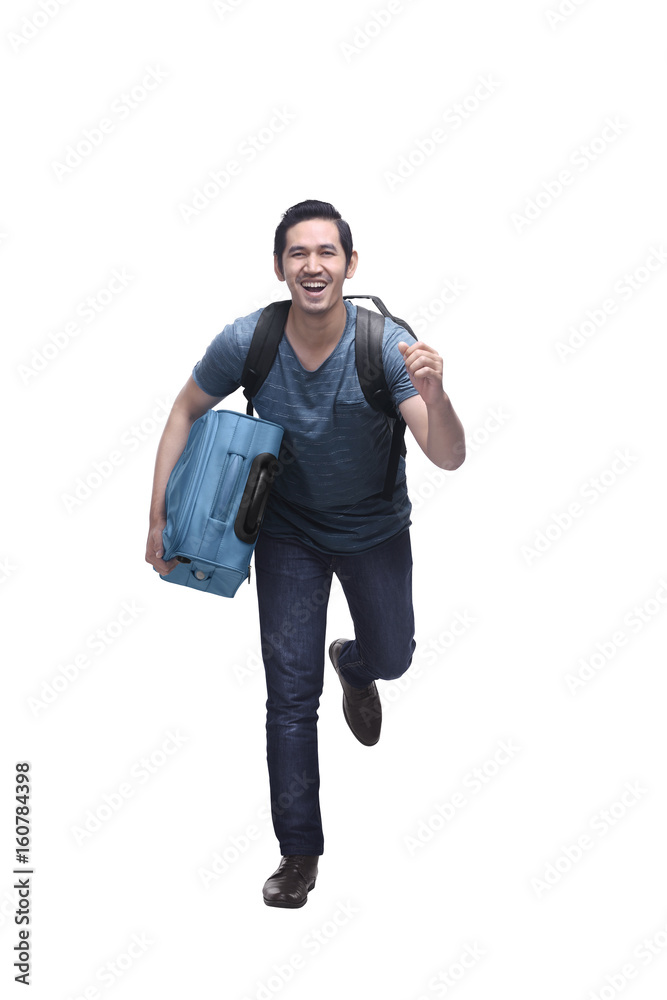 Attractive asian travelling man with suitcase running Attractive asian travelling man with suitcase running