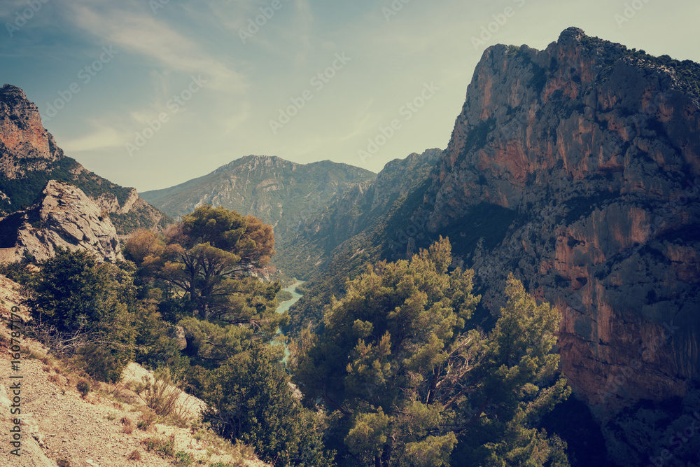 Verdon Gorge in France with a river, surrounded by cliffs - panoramic view, vintage style. Alpes-de-Haute-Provence, Provence-Alpes-Cote d'Azur