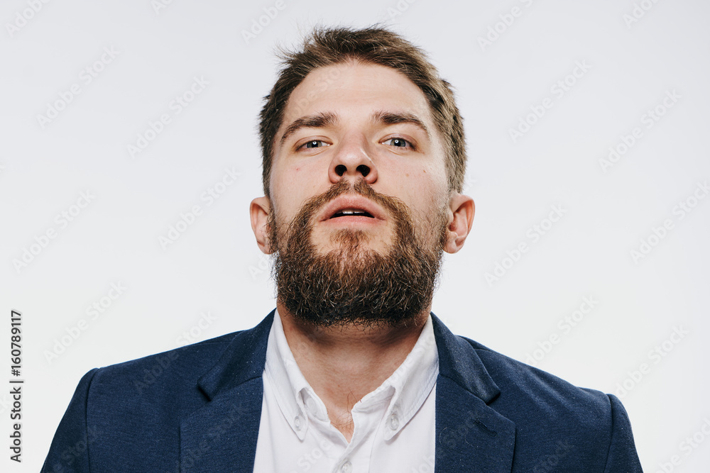 Businessman, businessman with a beard, businessman on a light background Businessman, businessman with a beard, businessman on a light background
