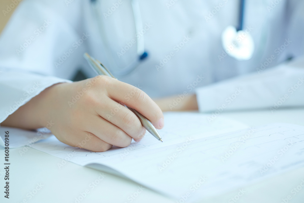 Doctor hands with cardiogram chart. Cardio therapeutist assistance physician make cardiac physical pulse measure document. Doctor hands with cardiogram chart. Cardio therapeutist assistance physician make cardiac physical pulse measure document.