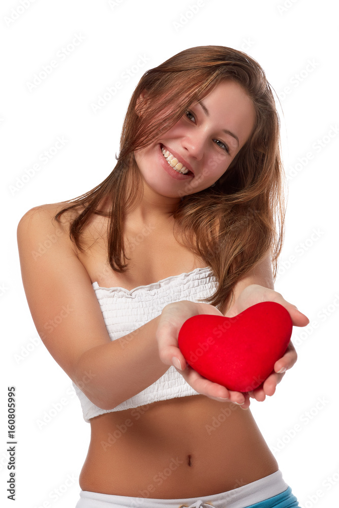 Girl with red heart in hands Girl with red heart in hands