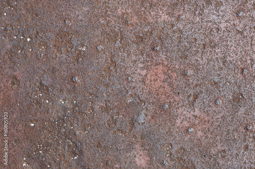 Texture of rusty metal with rivets