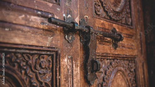 Metal Bolt On Wooden Carved Door