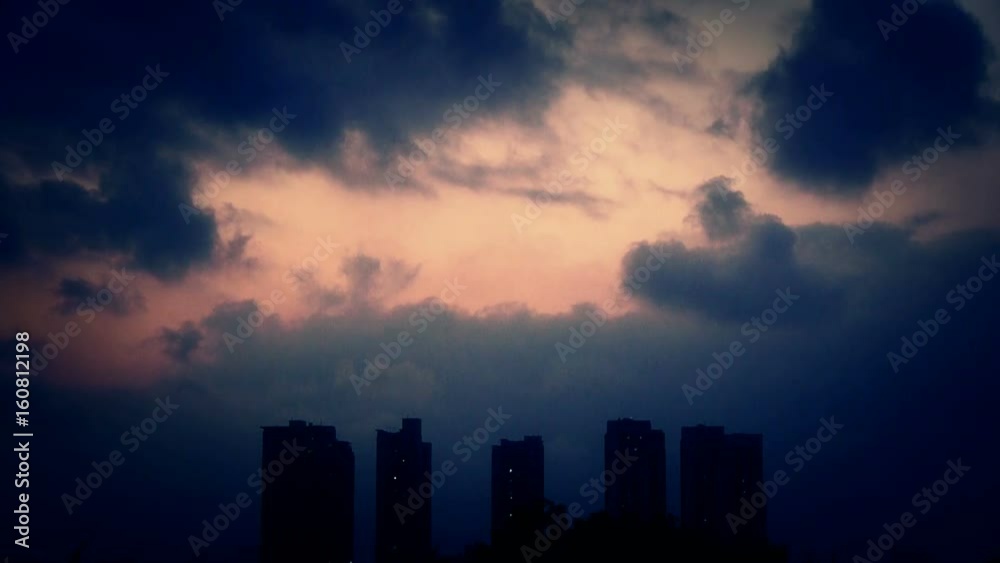 Dark clouds cover sky at evening,building high-rise,House silhouette. Dark clouds cover sky at evening,building high-rise,House silhouette.