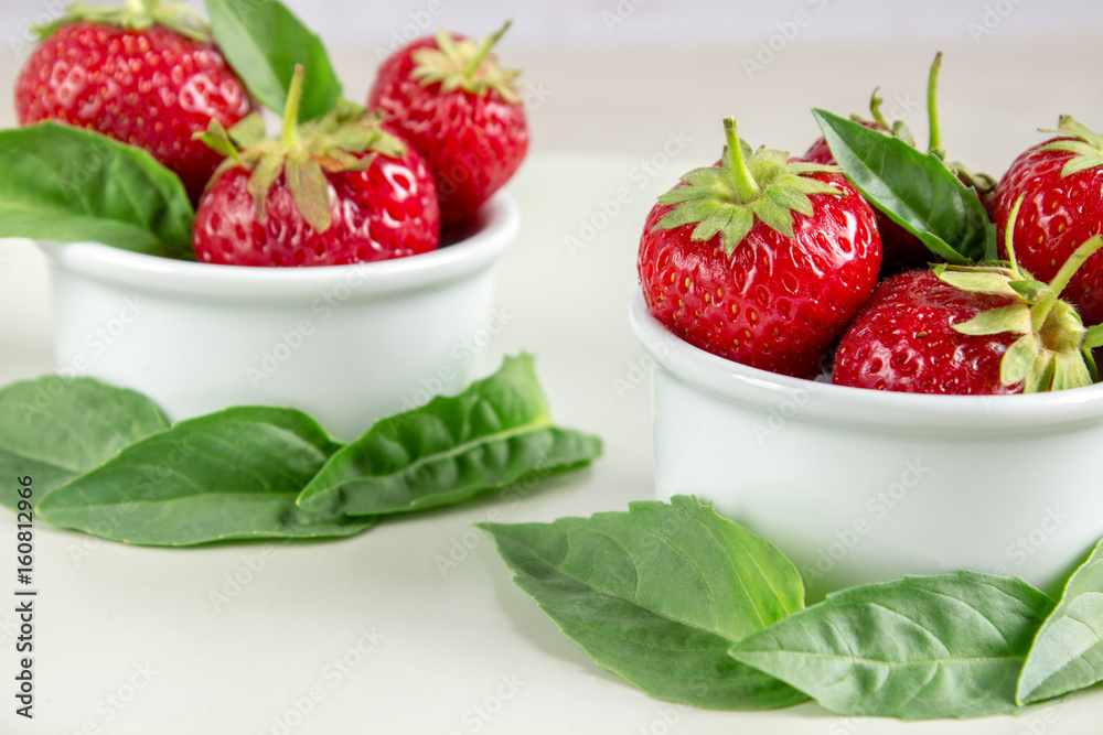 Ripe strawberries anf mint in a bowl Ripe strawberries anf mint in a bowl