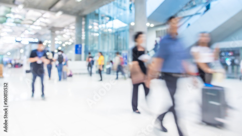 People Walking At Airport Terminal