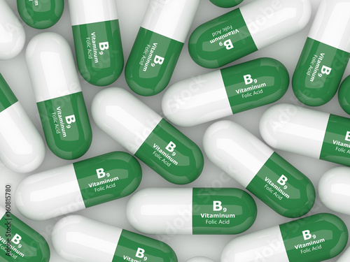 3d render of B9 folic acid pills over white photo