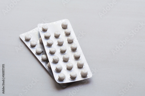 Packings of pills and capsules of medicines photo