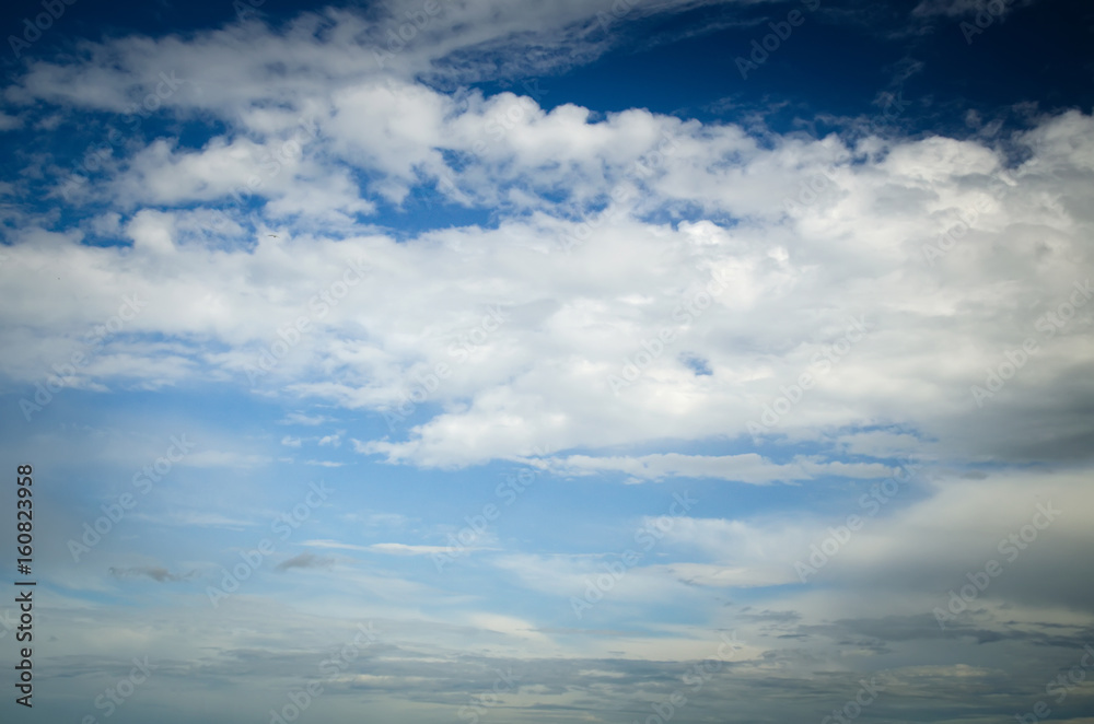 Dramatic sky. Saturated clouds before a thunderstorm, against the background of a blue sky. Dramatic sky. Saturated clouds before a thunderstorm, against the background of a blue sky.