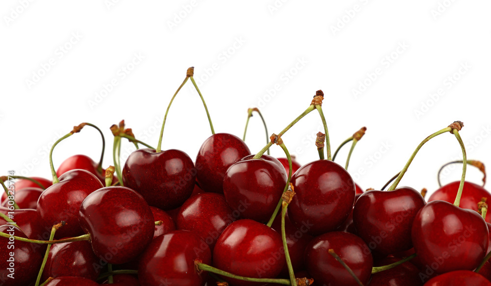 Heap of red sweet cherry isolated on white Heap of red sweet cherry isolated on white