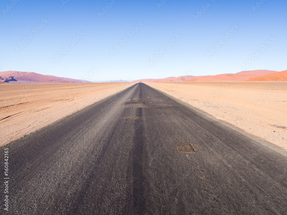 Road in the Namib-Naukluft National park in Namibia Road in the Namib-Naukluft National park in Namibia