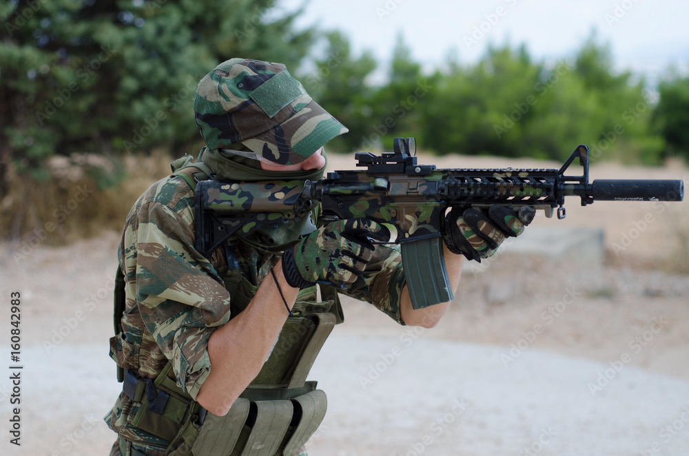 special forces army soldier M 4 with silence