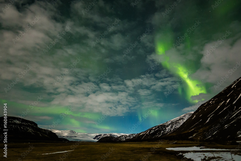 Northern lights over a glacier in Southern Iceland