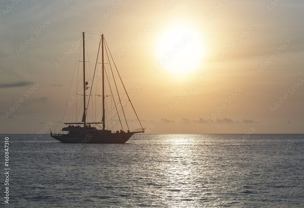 Vessels at Cala Saona in Formentera at sunset. Spain