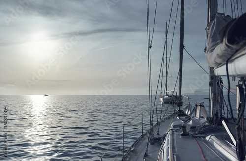 Fototapeta Naklejka Na Ścianę i Meble -  Yacht in the Mediterranean Sea at sunset. Ibiza. Spain