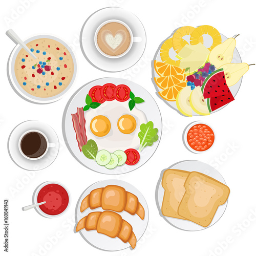 Breakfast set. Coffee, toasts, croissants, omellette, fruits, jam, oatmeal,  beans.