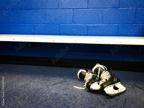 Canvas Print Hockey skates in locker room