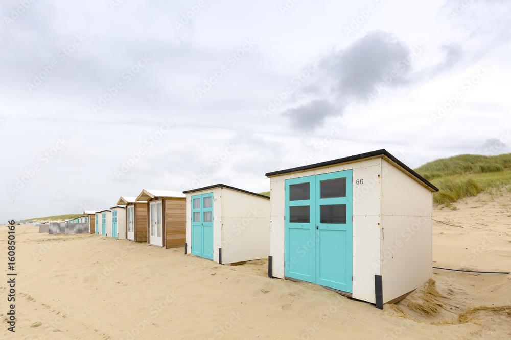 Texel, the Netherlands - 10 june 2017. Beach houses, Round Texel is the biggest catamaran boat race in the world. The race has its start and finish near Paal 17 on the North Sea. Texel, the Netherlands - 10 june 2017. Beach houses, Round Texel is the biggest catamaran boat race in the world. The race has its start and finish near Paal 17 on the North Sea.