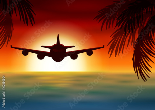 Airplane flies over the sea at sunset photo