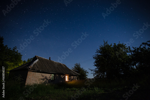 Country building under night sky