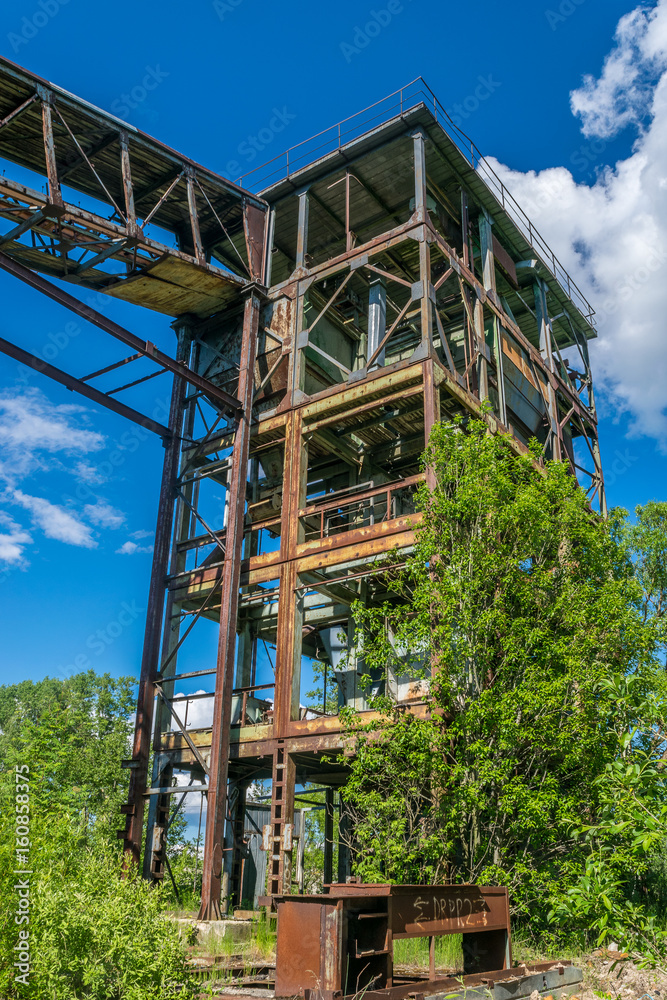 Old abandoned metal factory construction near town Lotoshino in Moscow region, Russia