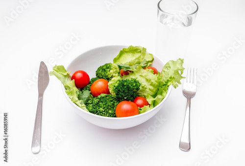 concept diet fresh vegetables on plate at white background