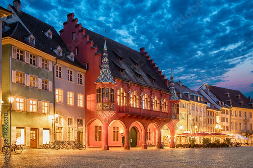 Historical building of Merchants Hall (Historisches Kaufhaus) built in 1520-21 and located on Munsterplatz squre in Freiburg, Baden-Wurttemberg, Germany