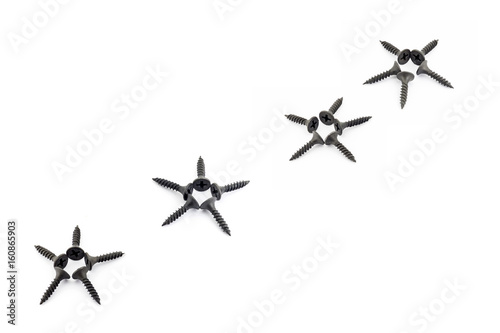 Five-pointed stars lined diagonally with black screws on a white background © Kakabadze