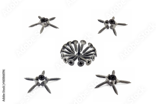 Four five-pointed stars and a circular composition are lined with black screws photo