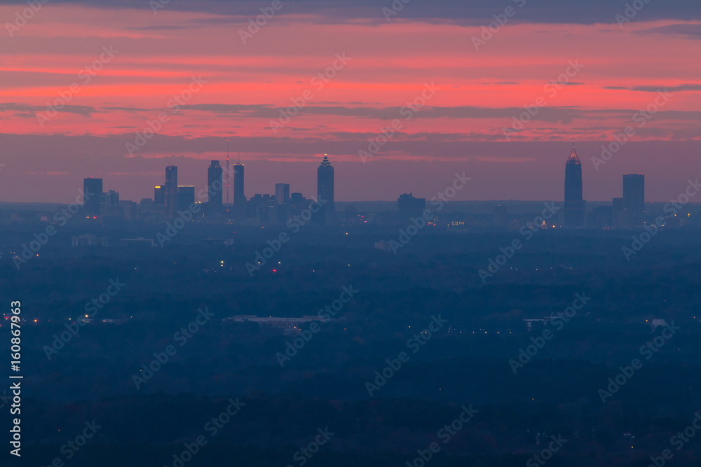 The beautiful view of Midtown Atlanta from the Stone Mountain at twilight with red sky, Georgia, USA