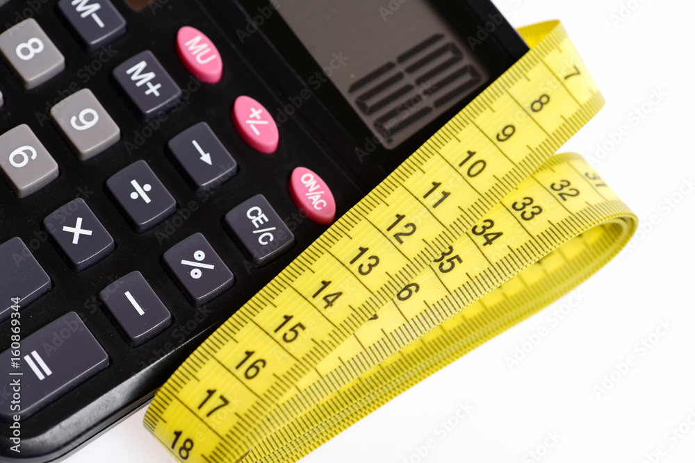 Calculator in black colour with 100 figure and measuring tape Calculator in black colour with 100 figure and measuring tape