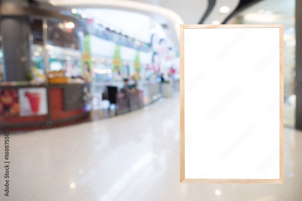 Blank billboard with copy space for your text message in shopping mall blur background