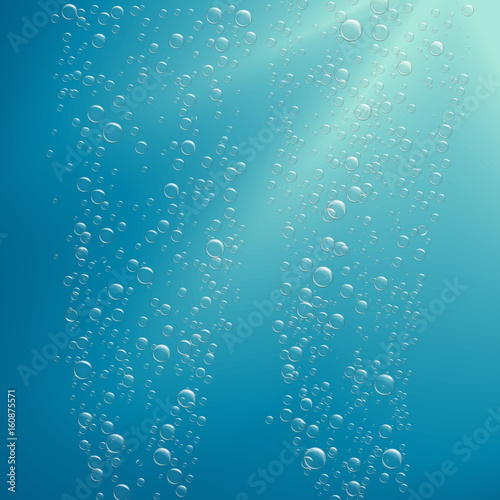 transparent bubbles of air floating in the water