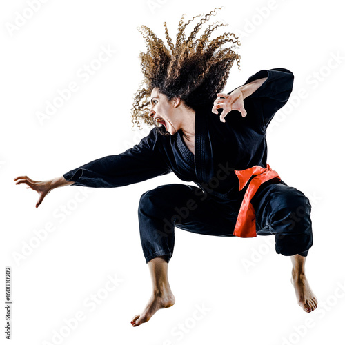 one caucasian woman practicing martial arts Kung Fu Pencak Silat in studio isolated on white background
