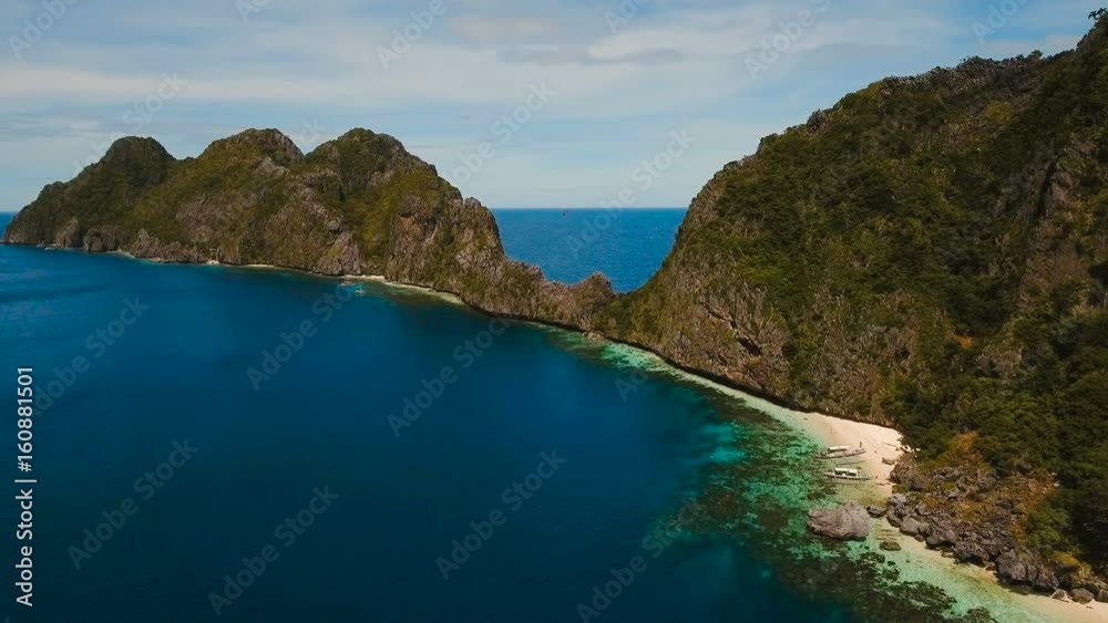 Tropical islands, aerial view. Aerial view: sea and the tropical island. Tropical bay in El Nido. Archipelago El Nido.Sandy beaches of the wild islands. Philippines National Marine Park. Aerial video Tropical islands, aerial view. Aerial view: sea and the tropical island. Tropical bay in El Nido. Archipelago El Nido.Sandy beaches of the wild islands. Philippines National Marine Park. Aerial video