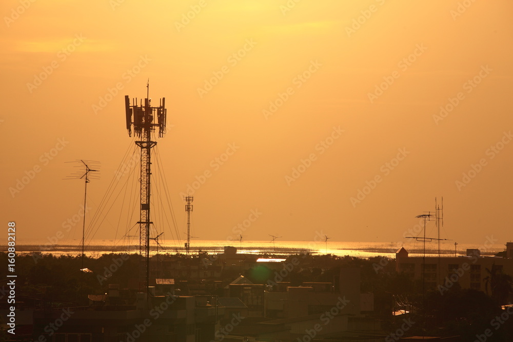 Communication transmission tower radio signal phone antenna or Telecommunication mast TV antennas or Satellite dishes