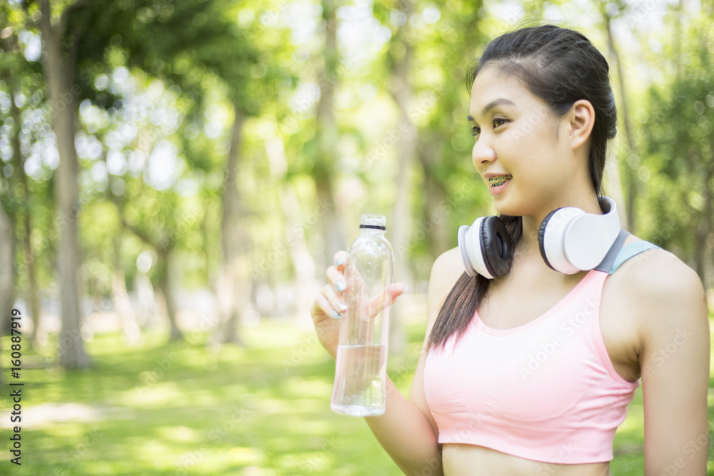 beautiful sport girl drinking water after jogging , sport concept beautiful sport girl drinking water after jogging , sport concept