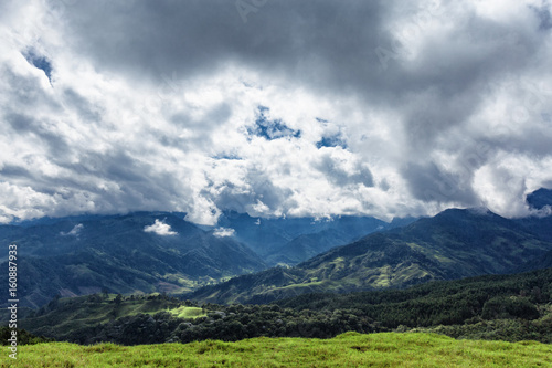 Valleys and dramatic clouds outside of Salento, Colombia. © Danaan