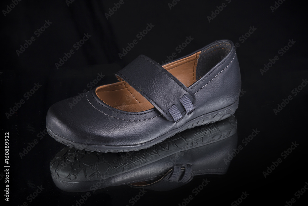 Shoes on Black Background, Isolated Product, Top View, Studio. Shoes on Black Background, Isolated Product, Top View, Studio.