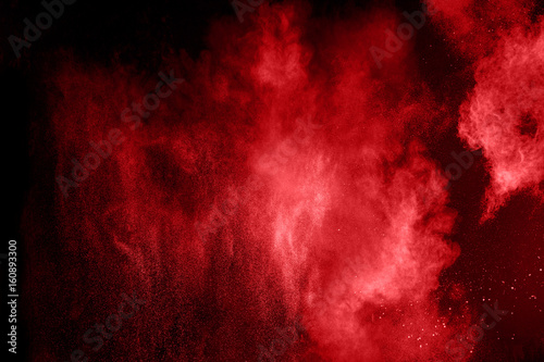 Color powder explosion on black background.