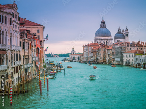 Beautiful view of famous Canal Grande with Basilica di Santa Maria della Salute. View of Canal Grande from Accademia's bridge. Venice, Italy. © Surajet.L