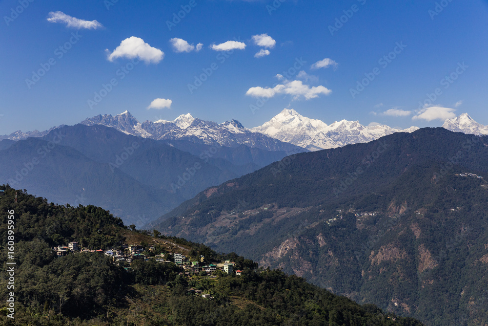 Kangchenjunga mountain with clouds above and mountain's villages that view in the morning in Sikkim, India