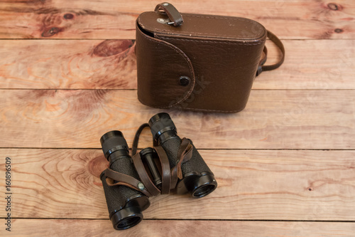 Binoculars for officers with a leather case