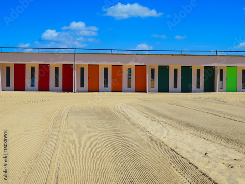 COLORED BEACH HUTS ON THE BEACH OF THE TOUQUET , PAS DE CALAIS, HAUTS DE FRANCE , FRANCE 