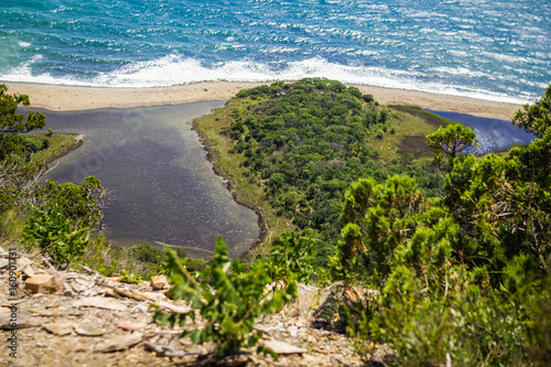 A colorful seashore is like an oasis in the middle of the ocean