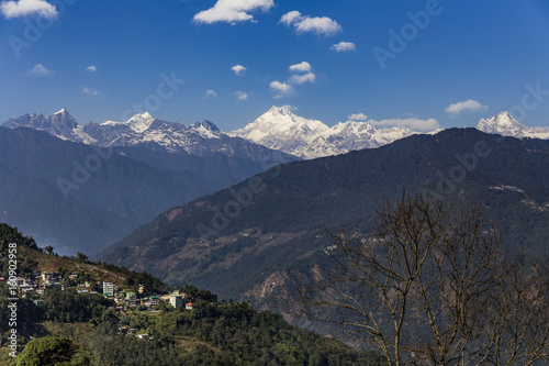 Kangchenjunga mountain with clouds above and mountain's villages that view in the morning in Sikkim, India