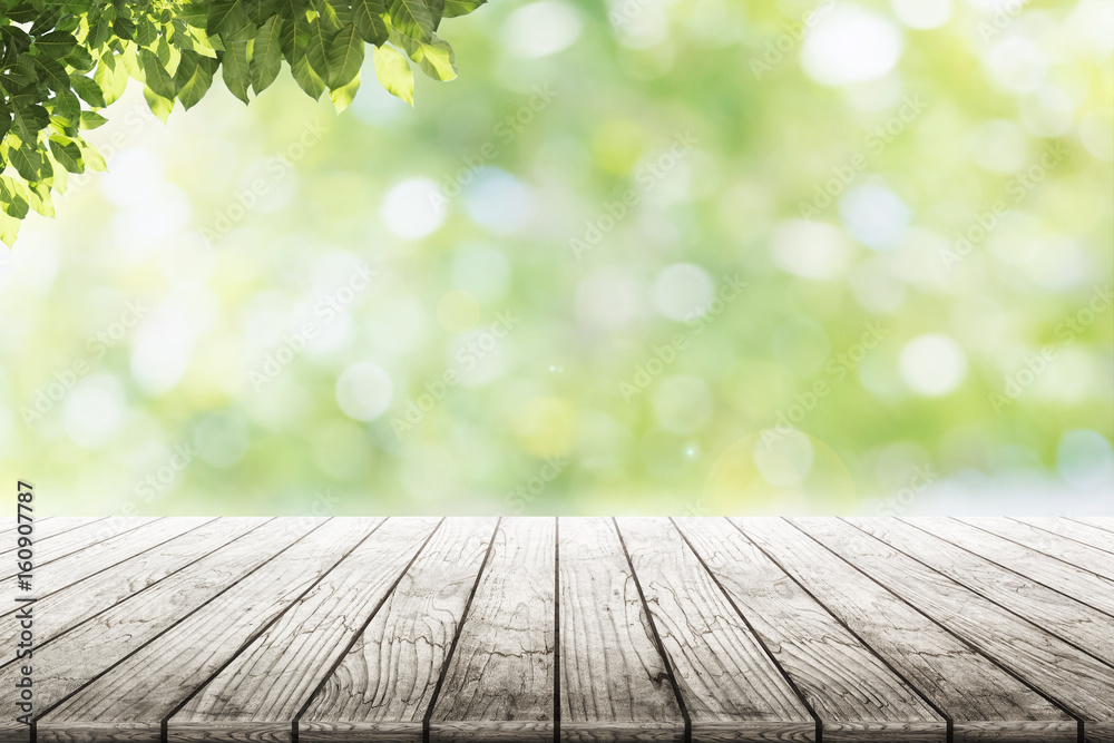 Empty wooden table with party in garden background blurred. Empty wooden table with party in garden background blurred.