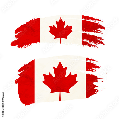 Grunge brush stroke with Canada national flag on white