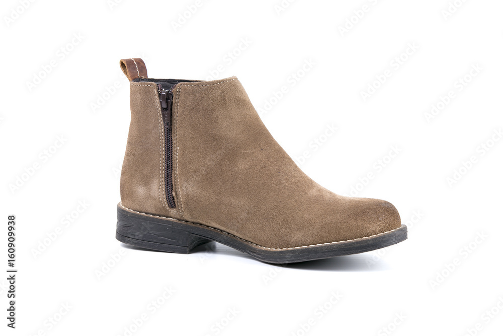 Female Brown Boot on White Background, Isolated Product, Top View, Studio. Female Brown Boot on White Background, Isolated Product, Top View, Studio.