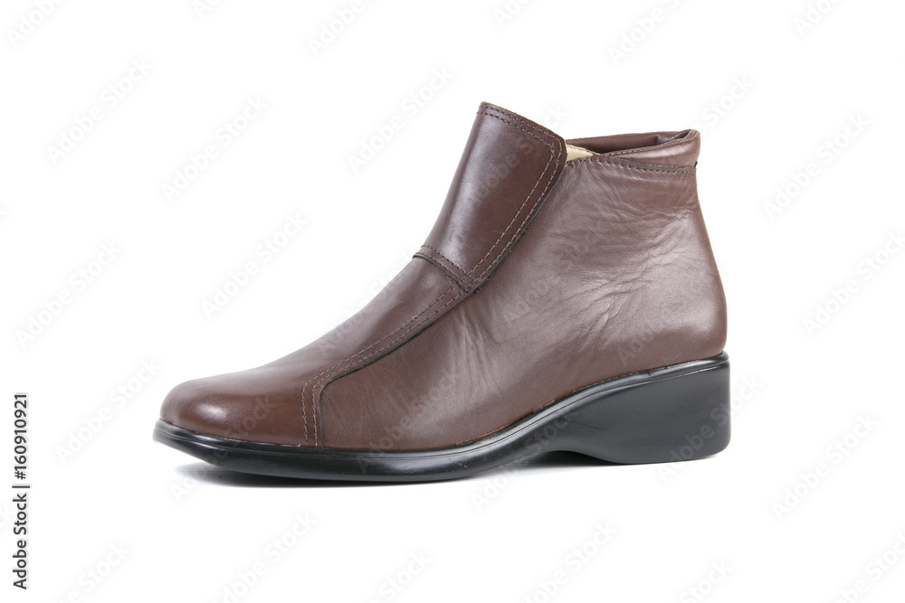 Brown Shoe on White Background, Isolated Product, Top View, Studio. Brown Shoe on White Background, Isolated Product, Top View, Studio.